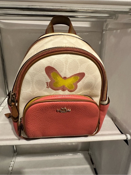 coach colorful backpack Mini Court Colorblock Leather Small Bag Red Pink Orange – Luxe Fashion Finds Signature coated canvas and smooth leather Inside zip and multifunction pockets Double zip closure fabric lining Handle with 2 1/4 drop Outside zip pocket Adjustable shoulder straps 10 3/4 (L) x 12 1/2 (H) x 4 3/4 (W) The Coach Foundation continues to partner with the Hetrick Coach Women's Court Backpack With